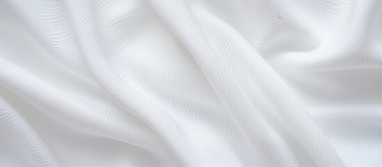 Sticker - White fabric close up displaying a delicate and intricate pattern woven into the material