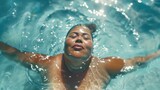 Fototapeta Londyn - Depict an energetic swimming session where fat women joyfully embrace the water, showcasing the freedom and exhilaration of swimming, the support of the water