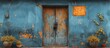 © Emin - Blue building with wooden door and planters