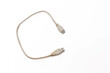 © Shozib - Old usb cable on white background