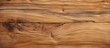 A detailed view of a section of timber showcasing a prominent knot on its surface