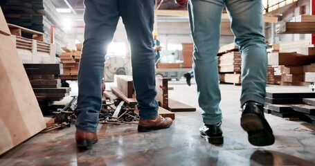 Canvas Print - Construction, workers and walking in warehouse building, project development and carpentry trade or craftsman ship with timber. People, industry renovations or labour with safety supervisor