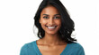 A beautiful Indian woman with dark hair wearing a blue top smiling against a white background in a studio shot