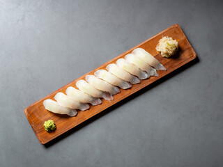 Canvas Print - Flatfish sushi on a wooden tray