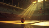 Fototapeta Fototapety sport - In the hush of an empty stadium, a basketball ball sits on the arena floor, its presence highlighted by the sun's rays filtering into the gym, symbolizing the dawn of a new day in sports.
