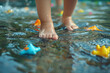 © devmarya - Child's Playful Time in Water. Close-up of child's feet and floating toys in water.