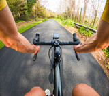 Fototapeta  - Cyclist's pov riding on picturesque road