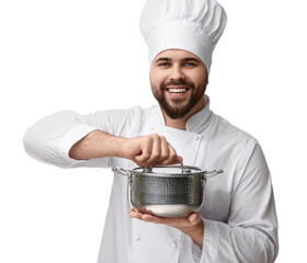 Canvas Print - Happy young chef in uniform holding cooking pot on white background