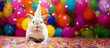 Adorable little rabbit with birthday hat and confetti over colorful background, panoramic banner. Generative Ai