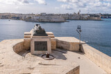 Fototapeta Uliczki - Panoramic view of Valletta bay, Malta and the Grand Harbour from the Siege bell war memorial