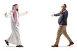 Full length profile shot of a saudi arab man meeting a friend