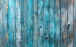 Captivating weathered aquamarine wooden planks with intricate grains and hues, creating a mesmerizing and textural background.