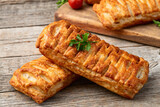 Fototapeta Panele - Golden Puff pastry stuffed with sausage and cheese