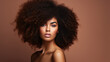 © ribelco - Beautiful african american girl with an afro curly hairstyle.