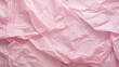 wrinkled pink crumpled paper