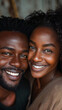 Joyful Black couple close-up, genuine smiles, intimate.