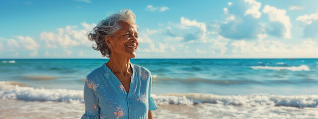 Wall Mural - Beautiful mature woman at the beach