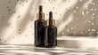 two black cosmetic bottles with gold elements, light background 