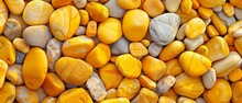 A Wide-angle View Of Luminous Yellow Stones, With Intricate Natural Patterns, Perfect For Panoramic Backgrounds.