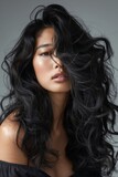 Fototapeta Panele - woman with long angular hair blowing out the curls, 