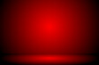 © Oracha - empty 3d studio room background in red gradient color,Smooth blur background like in a room with spot lights shining on the floor or on the stage,Vector illustration