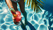 Colorful Tropical Cocktail by Poolside with Palm Shadow