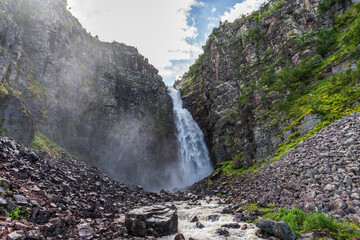 Wall Mural - The beautiful waterfall Njupeskar in northern Sweden