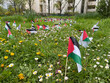 Gennevilliers, France - 04 01 2024: Eco-neighborhood. View of Palestinian flags planted in a park in support of the people of Gaza.