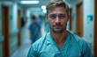 close up male nurse on a hospital hallway, blonde man in his 30s working long shift tired. Healthcare wallpaper with copy space