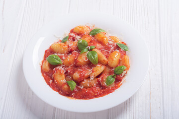 Canvas Print - Italian homemade potatoes gnocchi with tomatoes sauce