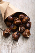 Tasty fried chestnut snack background