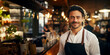 A young, cheerful male bartender wearing an apron stands behind the bar with a warm and welcoming smile. Generative AI
