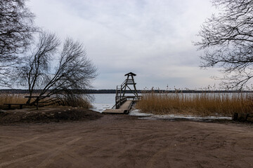 Wall Mural - birdwatching tower on the shore of the lake, Slokas nature trail, Latvia