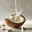 Milk being poured into a halved coconut with splashes around, against a neutral background. Essence of tropical freshness captured.