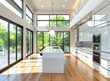 White modern kitchen with island, large windows and high ceiling
