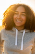 Mixed Race Biracial African American Girl Teenager Smiling at Sunset