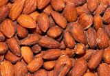 Fototapeta  - close up of many roasted almonds