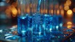 Liquid is being poured from a glass bottle into a glass on the table, creating an electric blue fluid. It is a drinkware event