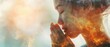 It is a double exposure of a hand girl praying and worshiping in the church, with Folded Hands in Prayer concept for faith, spirituality, and religion, and with Hands Raise In Worship background.