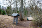 Fototapeta Tęcza - View of the information stand and observation deck in early spring.. Vilce Nature Park. Latvia.