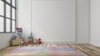 © paisorn - a playroom with a blank white wall; a rug that is pink purple and blue; hardwood floors; stacking blocks; a stack of books on the floor