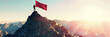 Climber puts a red flag on top of a mountain to present concept of success, Symbol of Victory
