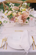 Elegant wedding place setting with gold accents