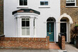 © Alex Reyto/Stocksy - Front facade of a Victorian terraced home in London.