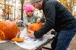 © Bethany Birnie/Stocksy - Pumpkin Carving with Father