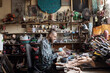 © Demetr White/Stocksy - sculptor in the workshop