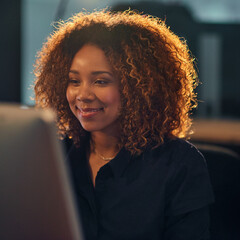 Poster - Business, woman and computer with research at night for creative deadline, project planning and confidence. Professional, employee and technology in office for software test management or efficiency