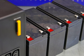 An electric rechargeable battery for installation in an uninterruptible power supply.