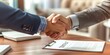© Orod - Professional Business Handshake Over Contract Agreement