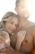 © peopleimages.com - Couple, lens flare and portrait on vacation with hug for love in relationship on white background. People, embrace and travel on holiday for trip, summer and sun with mockup in outdoor with sunshine